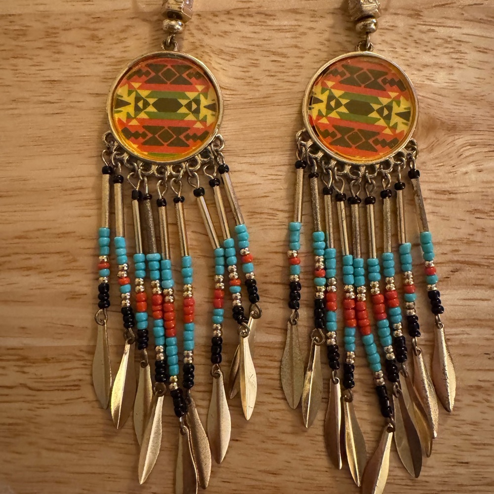 Gold and Red Dangling Earrings with Colorful Pendants and Feather Charms